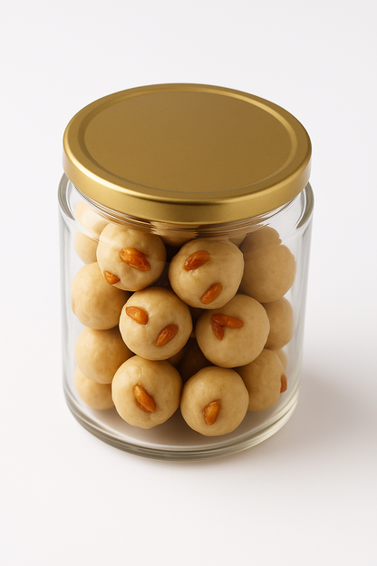 “NutriPalm Cashew Coconut Laddoos – creamy cashew and coconut sweets made with natural ingredients, dates, and jaggery.”